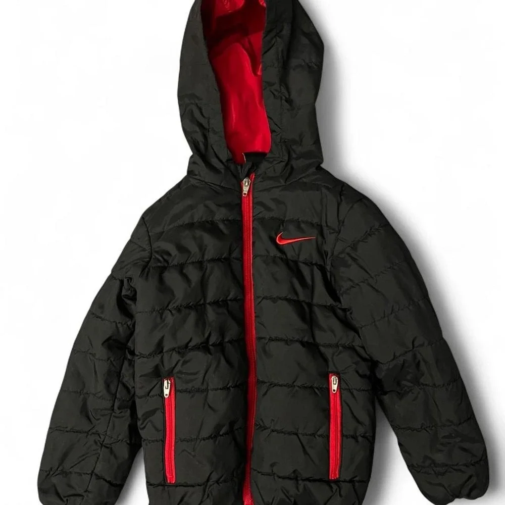 Nike black puffer jacket with red accents, size XS